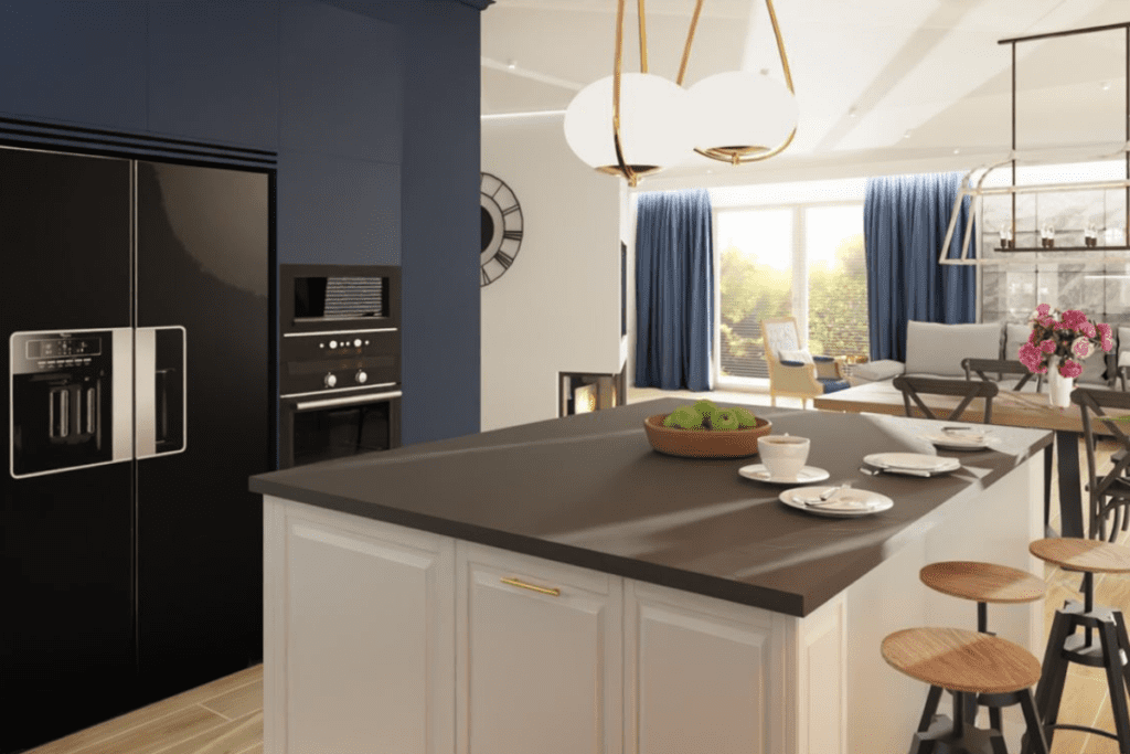Kuchnia z wyspą oddzielającą salon